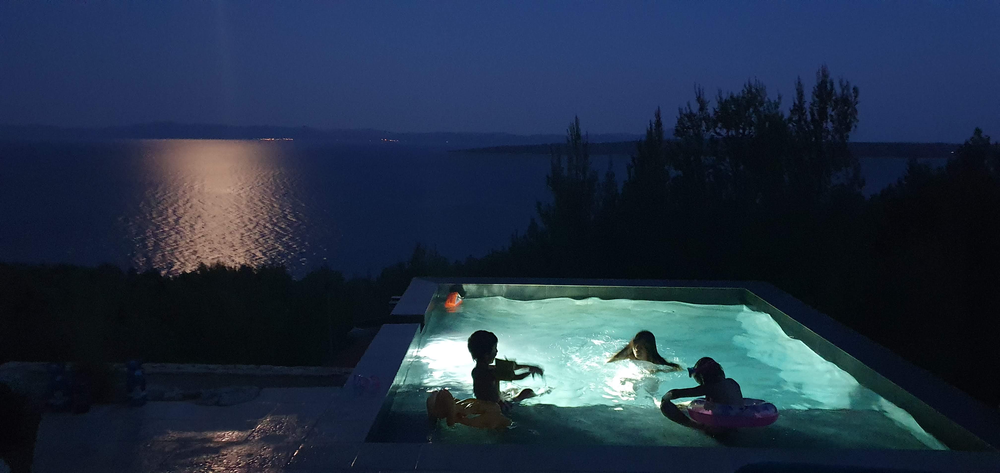 Night swimming in the pool